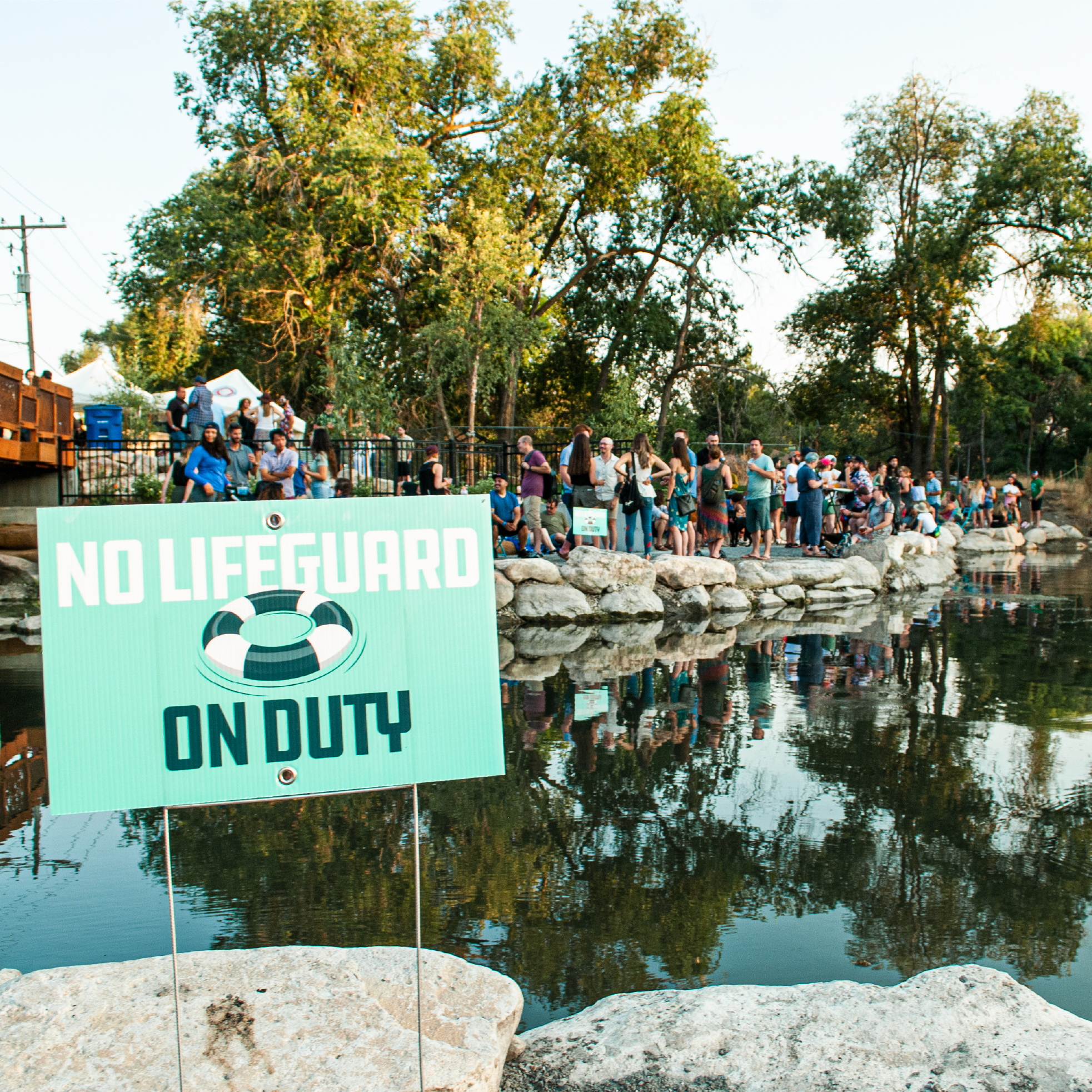 No Lifeguards on Duty Sign at the Three Creeks Confluence Opening Celebration in Salt Lake City